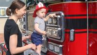 Friendship Firehouse Festival, truck with mother and child, 2022