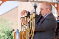 Lighting the menorah candle