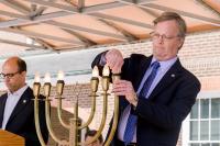 Lighting the last Menorah candle