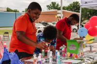 Three preteens painting and crafting