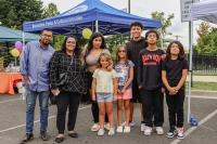 A family poses for the camera