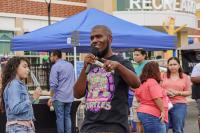 Even't DJ is dressed in a black shirt with Ninja Turtles print