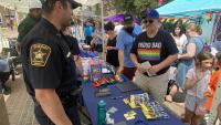 deputy and community members at Pride event at Market Square