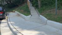 A photo of a new sidewalk on Polk Avenue
