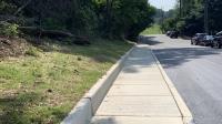 A photo of a new sidewalk on Polk Avenue