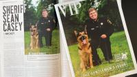 magazine cover and article showing Sheriff with German shepherd dog from animal shelter