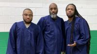 three men in blue chorus gowns