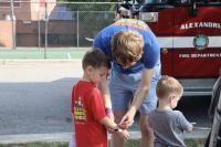 Tons of Trucks participants dad with two boys