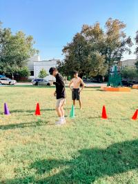 Image of teens playing games on a field