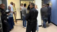 Deputies speak with several community members on tour of jail