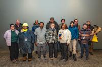 Photo of 13 staff in winter clothes