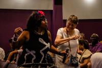 Two women are dancing 