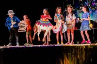 Performers standing around on stage