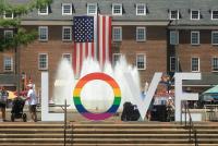 LOVE letters, with rainbow "o" in front of City Hall