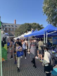 People walking between tents at Alexandria Pride 2025