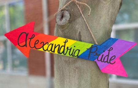 Alexandria Pride on rainbow colored arrow