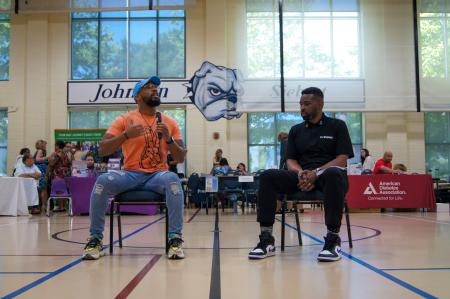 Two men in conversation