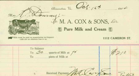 A 1914 receipt for $2.10 for 30 quarts of milk, from M.A. Cox & Sons, Pure Milk and Cream, at 1112 Cameron Street. The header shows an image of a cow.