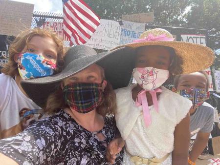 Van Pelt siblings at a protest.