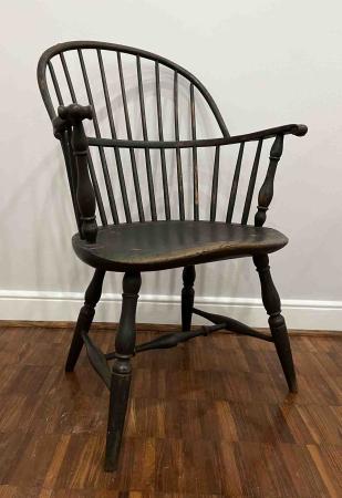 A Windsor arm chair.