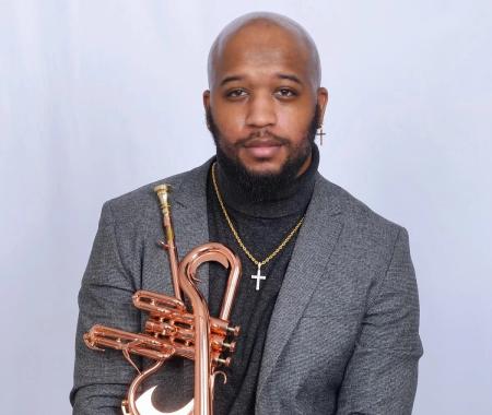 man holding a trumpet
