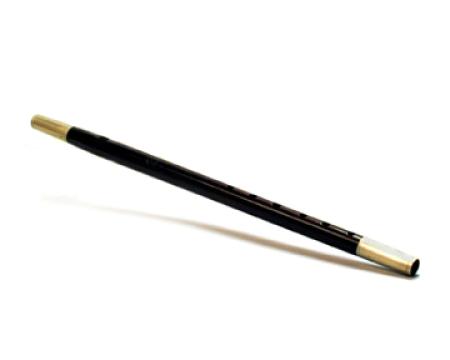 A long wooden instrument with brass-colored ends.