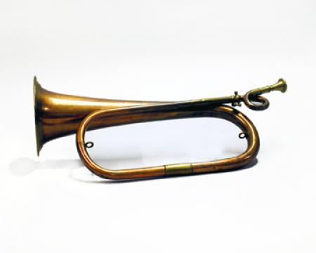 Copper bugle with a loop on the brass mouthpiece.