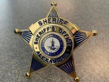 photo of a gold sheriff badge