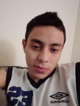 A picture of the young man that is missing, he has a short cut with black hair, oval face.  