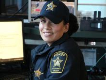 deputy working at desk in screening center