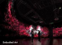 picture of people looking at a galaxy image