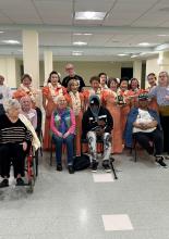 Picture of adults with volunteers from a dance program