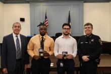 Deputies standing with clerk of court and sheriff after being sworn in