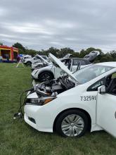 City vehicles EVs at a park