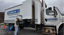 big truck with a city staff to take the shredded paper