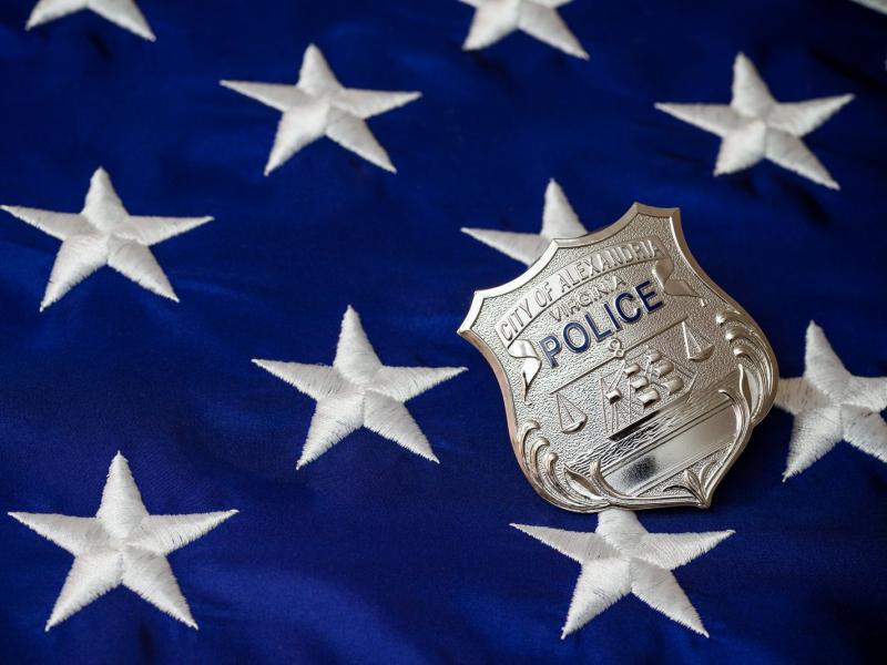 Alexandria Police Badge on Flag with Stars