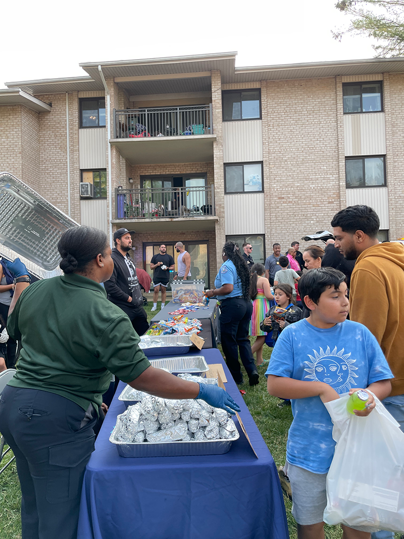 Community Cookout Photo 3 - food being served to the guests